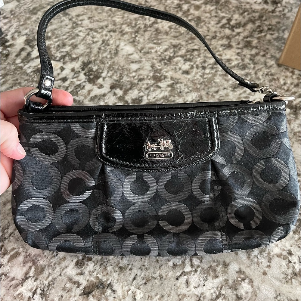 Coach black signature canvas clutch. Excellent condition!